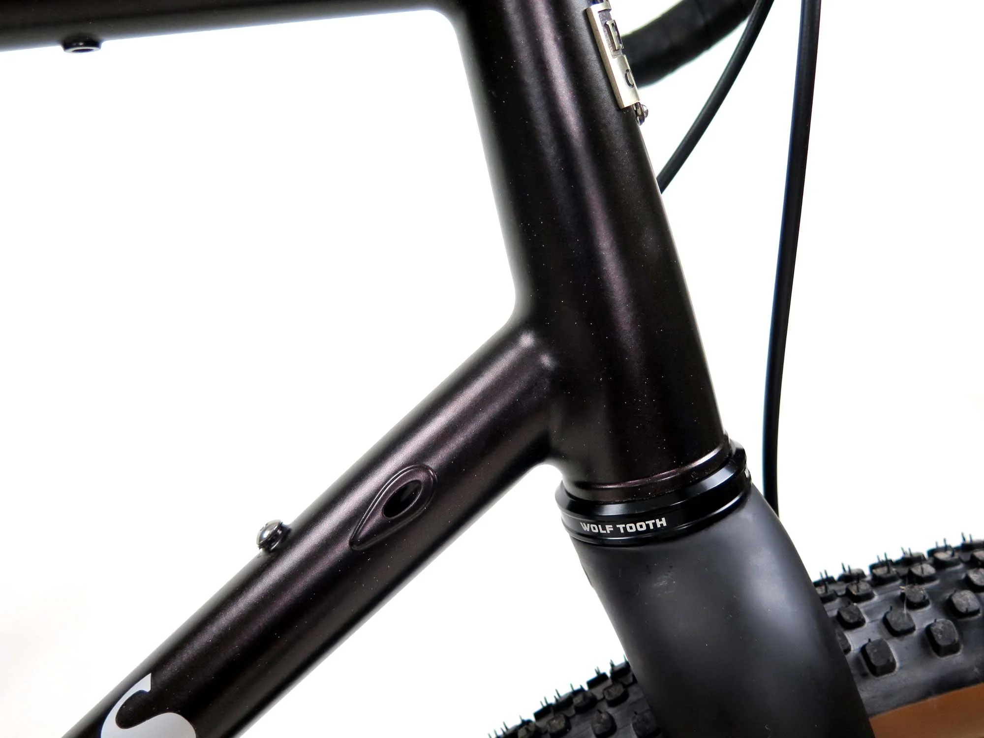  Internal routing in the down tube for a dropper post, and a carbon Whisky fork up front for now. I plan to build a steel fork eventually that will accommodate 2.8” tires to match the rear.   
