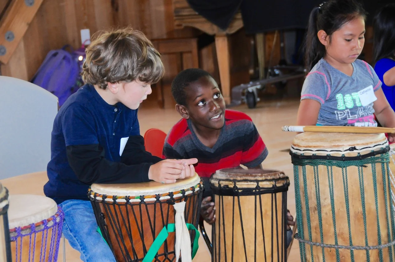 Cameron-Jeannie Richards grandson learns drumming with a  friend. .jpeg