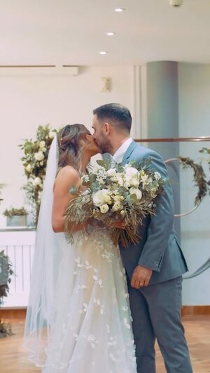 Couple kiss at their Grantham wedding