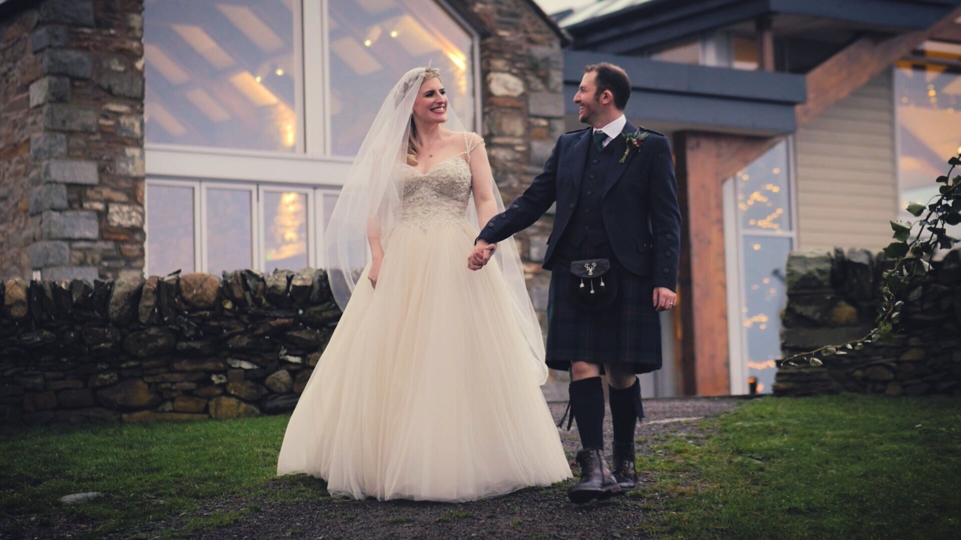 Bride and groom doing poses for wedding video