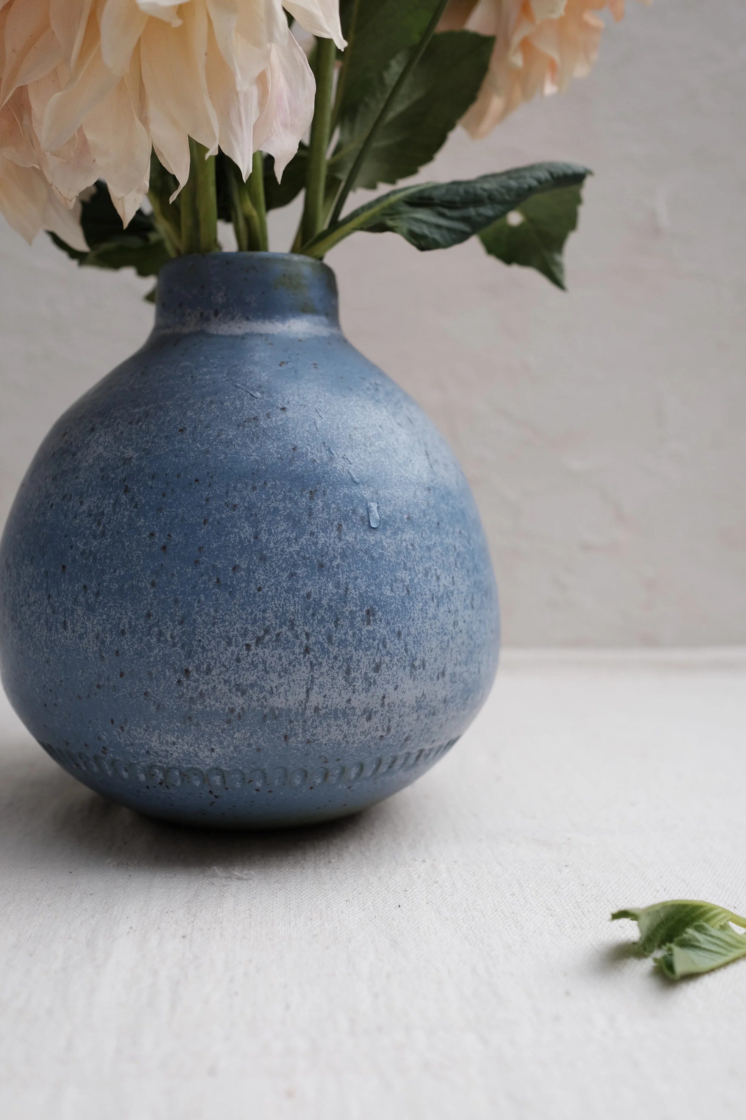 HAND COILED BLUE VESSEL