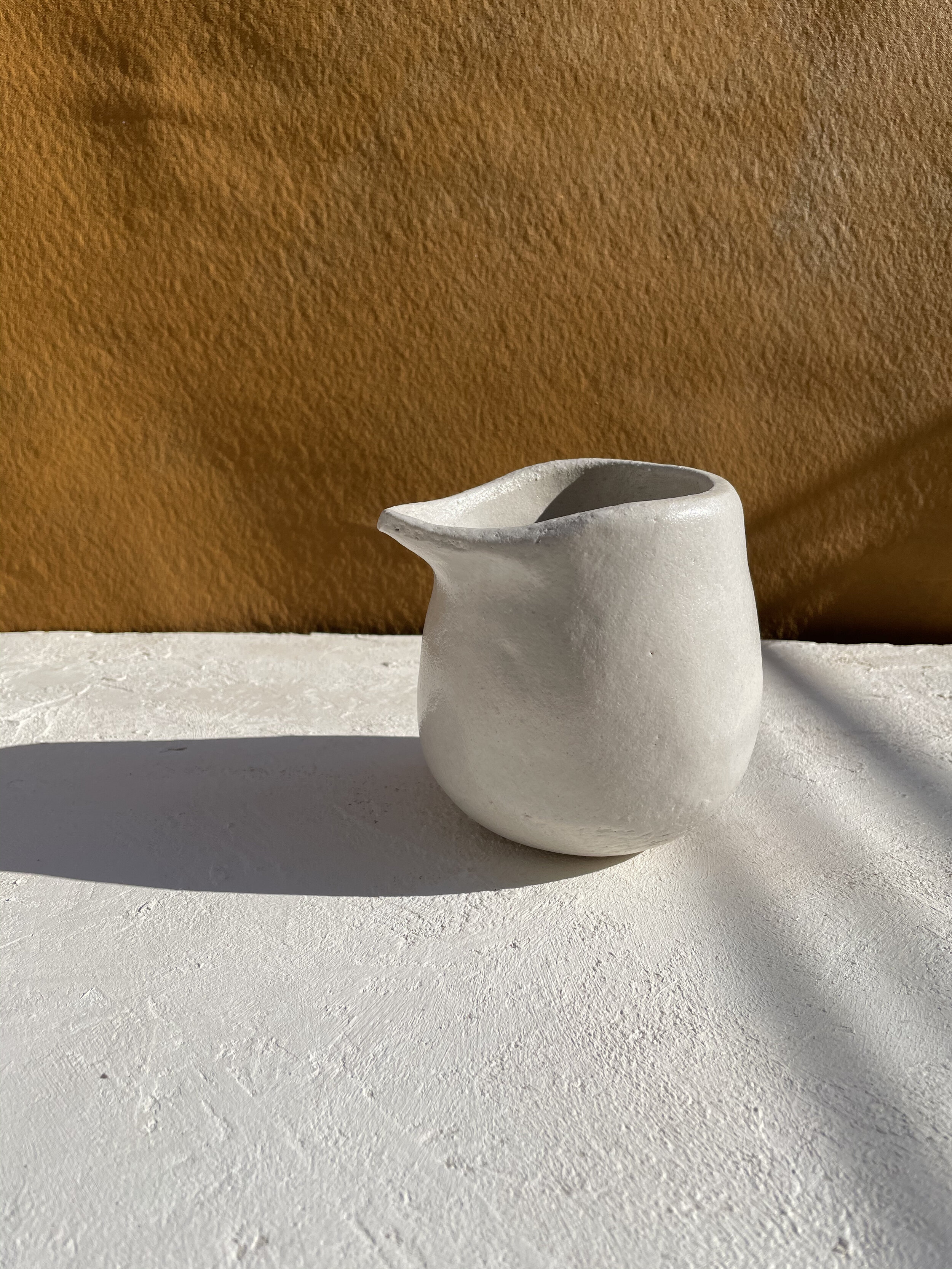 SMALL POUR VESSEL IN FOG