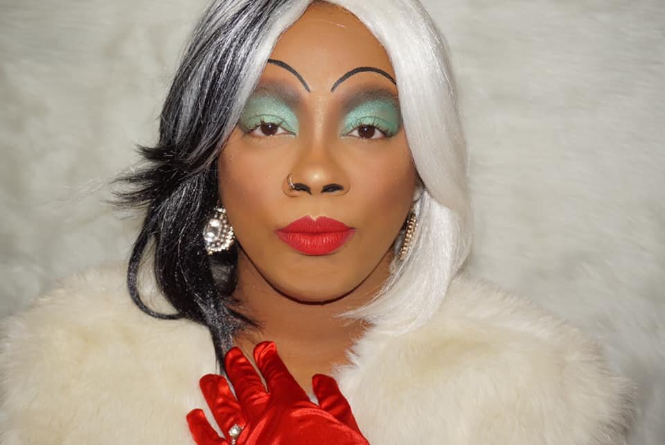 Cruella's Black Face Paint and Shimmery Red Lip