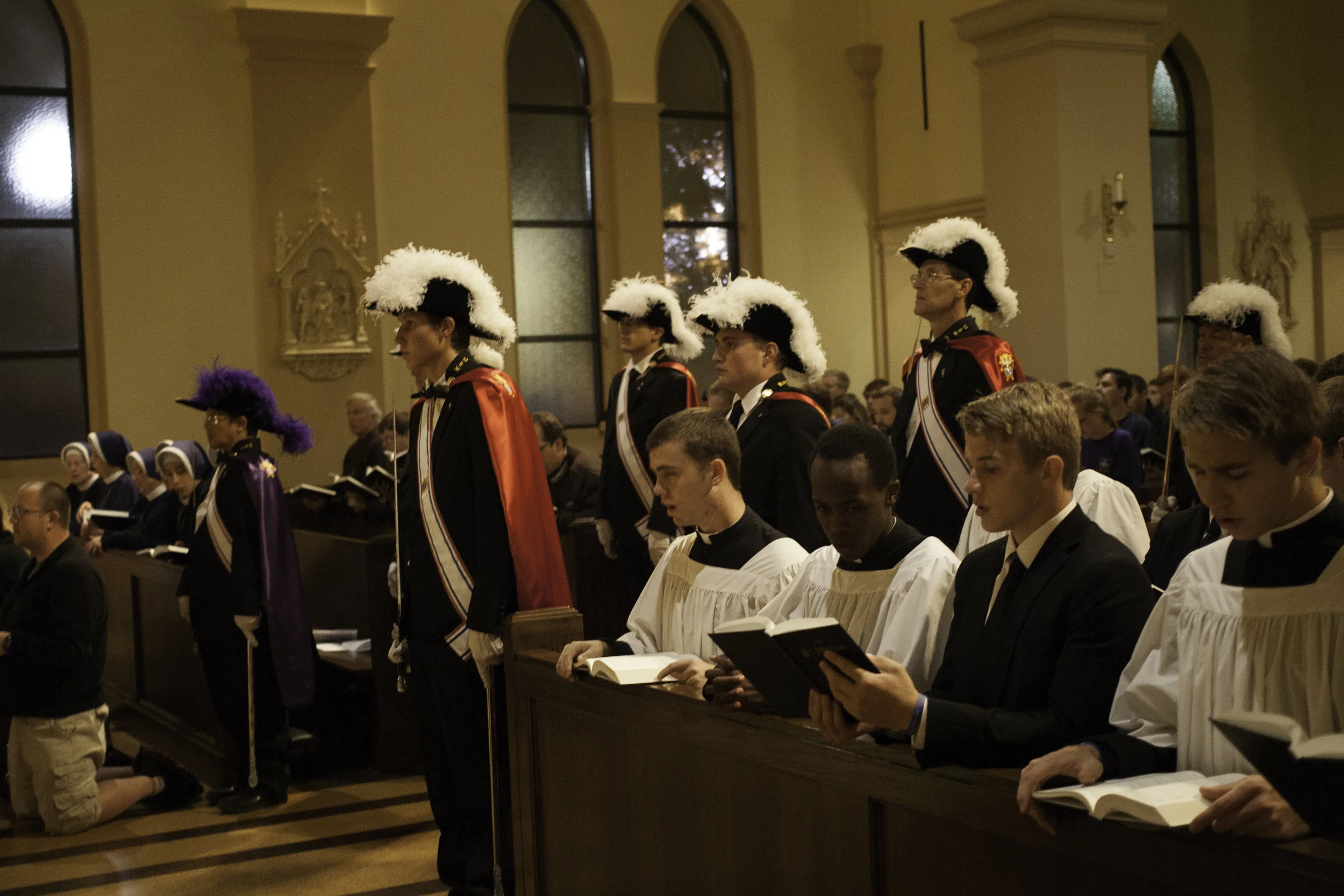 Knights prepare for Mass at St. Thomas Aquinas on the campus of UNL. 