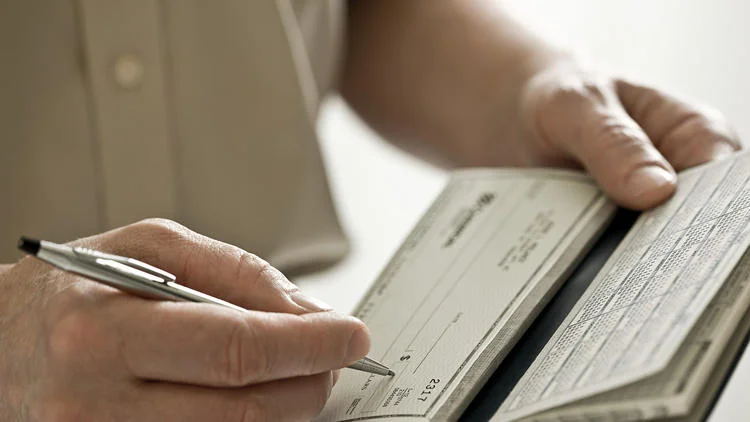 Americans can tax advantage of the GOP tax plan already, including by a donating to charity before the end of the year. (Image Source / Getty Images)