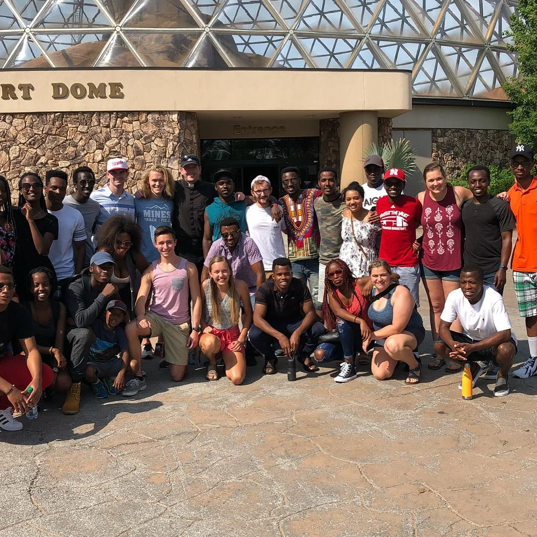 Father Mills organized a group trip to the Henry Doorly Zoo in June.