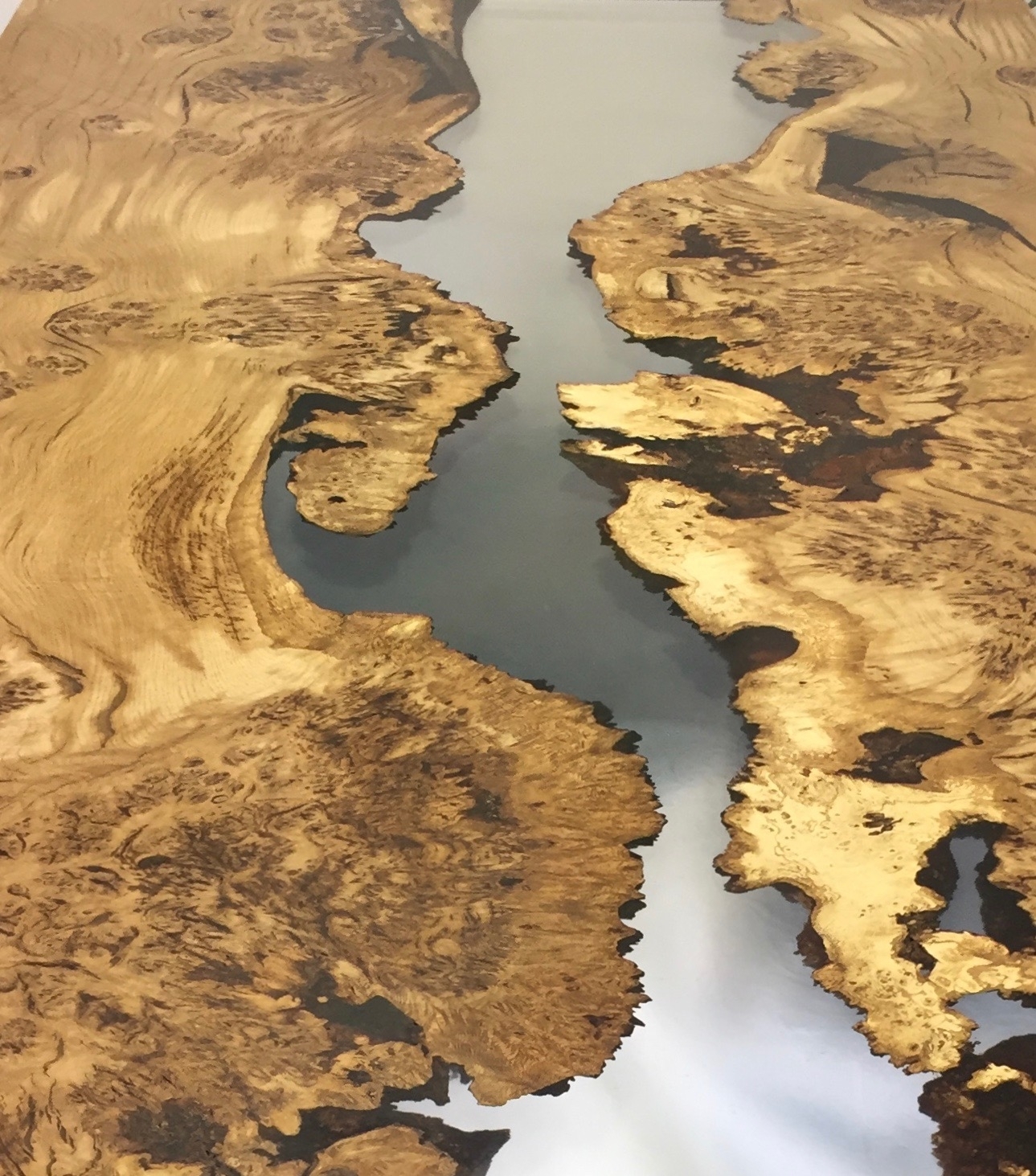 Surface of Burr and Pippy Oak and Resin River Table