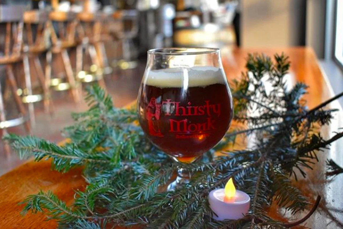 The much beloved, original Thirsty Monk brewpub serves up many beers to warm you up during the holidays.
