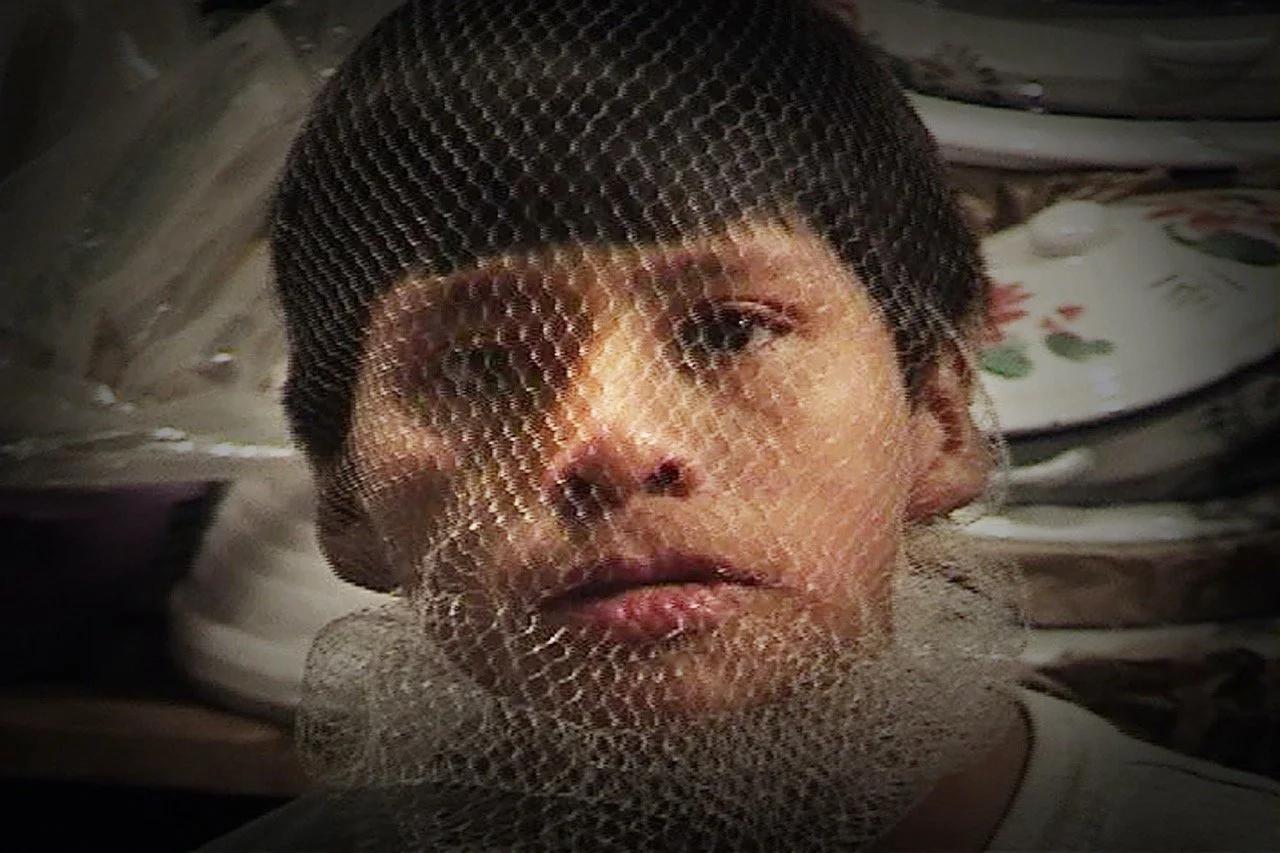 Chiapas Boy in Market net face Large Large.jpeg