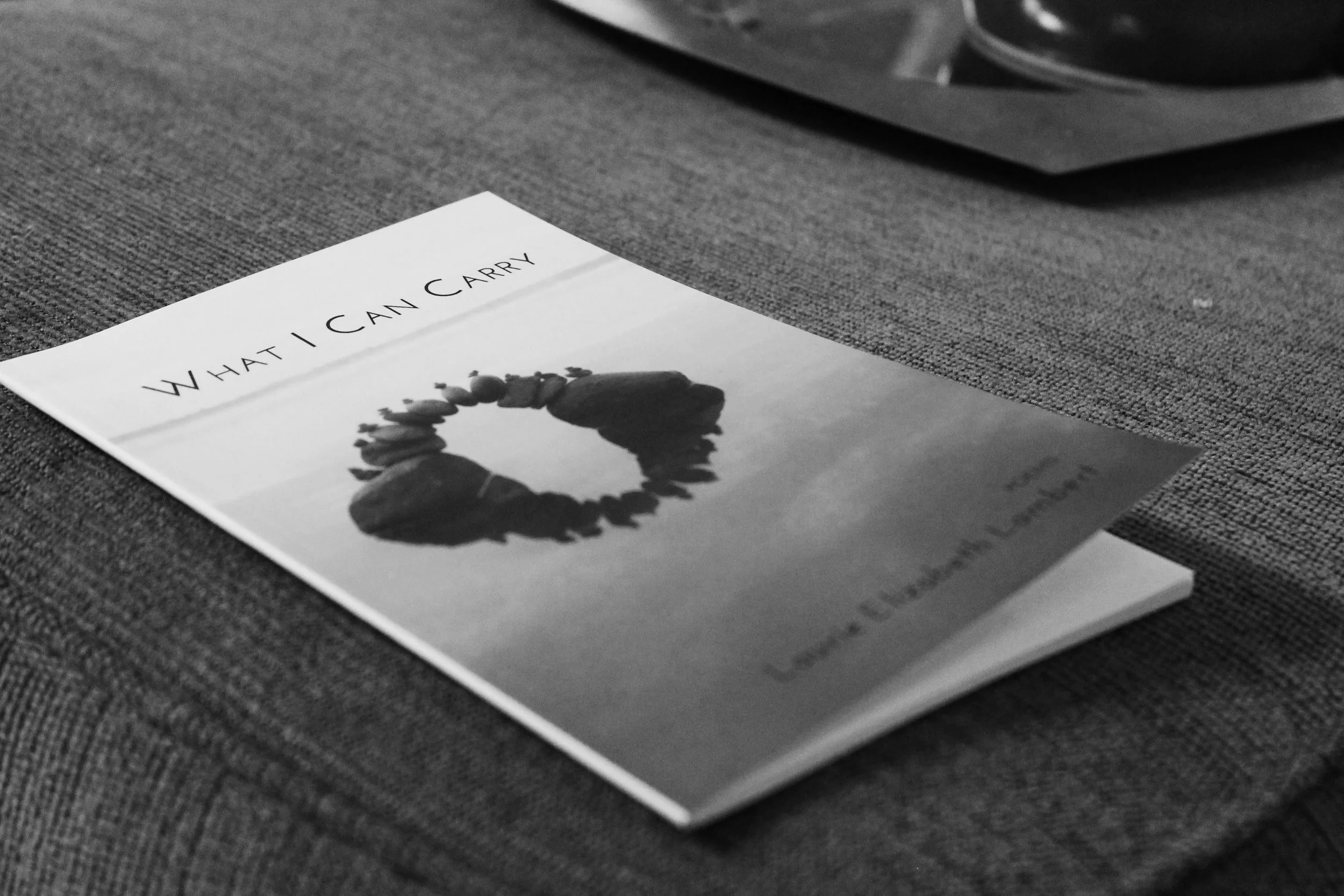 A copy of Laurie Lambert’s book, What I Can Carry .