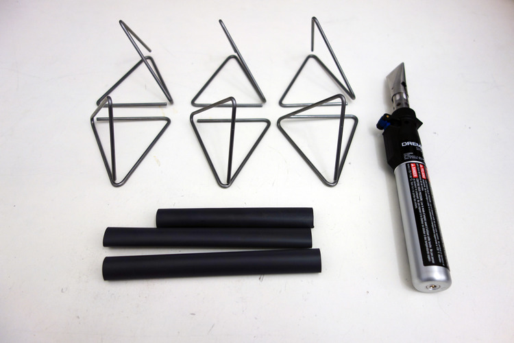You'll end up with this tetrahedral shape. Repeat six times and get out the heat shrink.