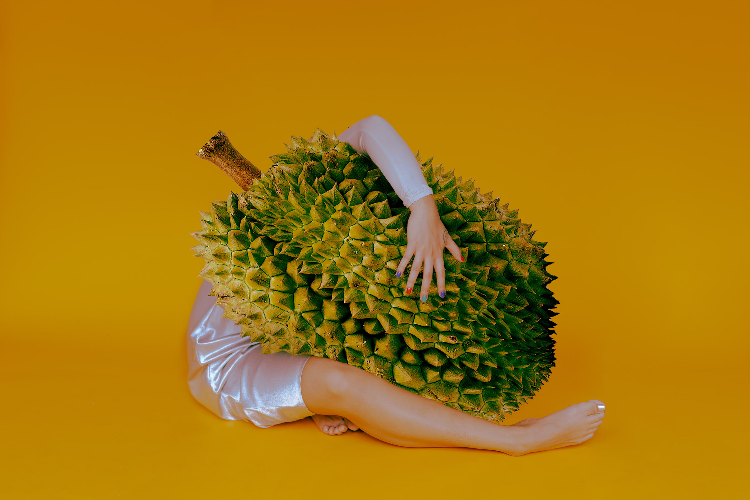  Ode to Durian is a self-portrait photo series that connects my family narrative to that of the controversial Durian fruit. The challenges that the Durian faces in America is not that different from the challenges that I face when I bring up my famil