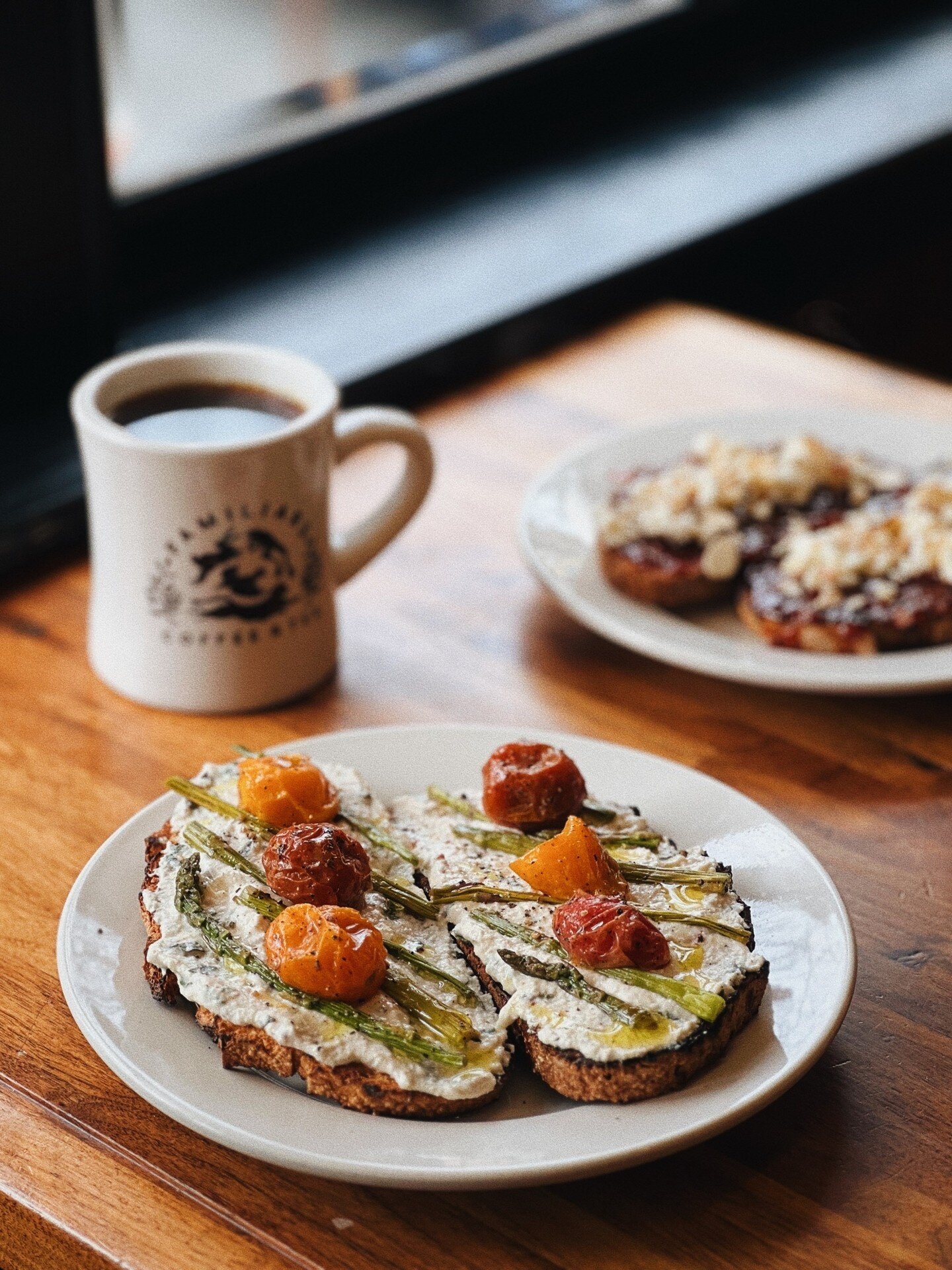 Two new toasts for the season!
&bull;
Check out our new Peppered Basil Ricotta &amp; Tomato Jam Toasts! 
&bull;
House made herbed ricotta with basil and black pepper, blistered cherry tomatoes, and roasted asparagus drizzled with extra virgin olive o