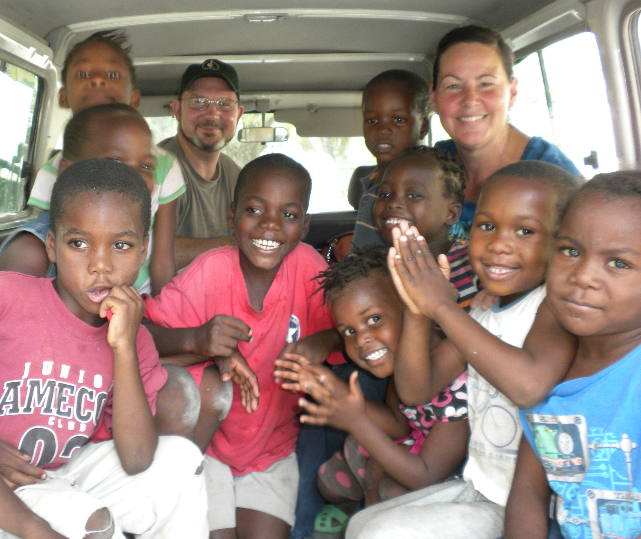 Christina Moynihan (back, right) with the inspiration and motivation for a full-time development center.