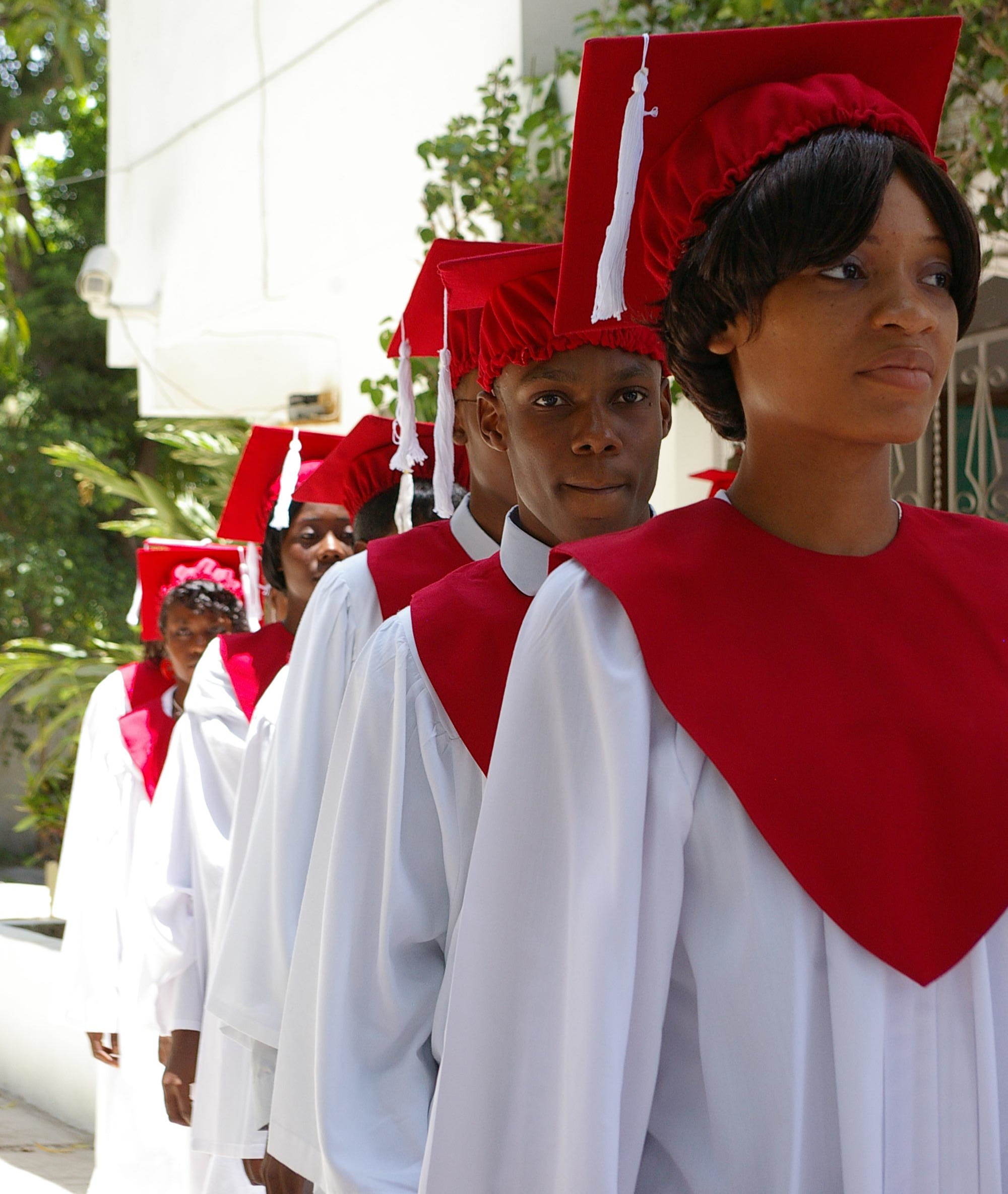 TheHaitianProject Graduates Walking.png