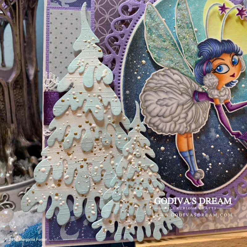 Wintry Christmas Card “Dance of the Snowflakes” by Godiva’s Dream. Christmas is most magical when there’s freshly fallen snow around. I took inspiration from a quiet snowy night to create this wintry fairy card. Wrap up warm and continue reading to find out all the crafty details about this project. #cardmaking #handmadecard #handmadechristmas #christmascard #papercrafting