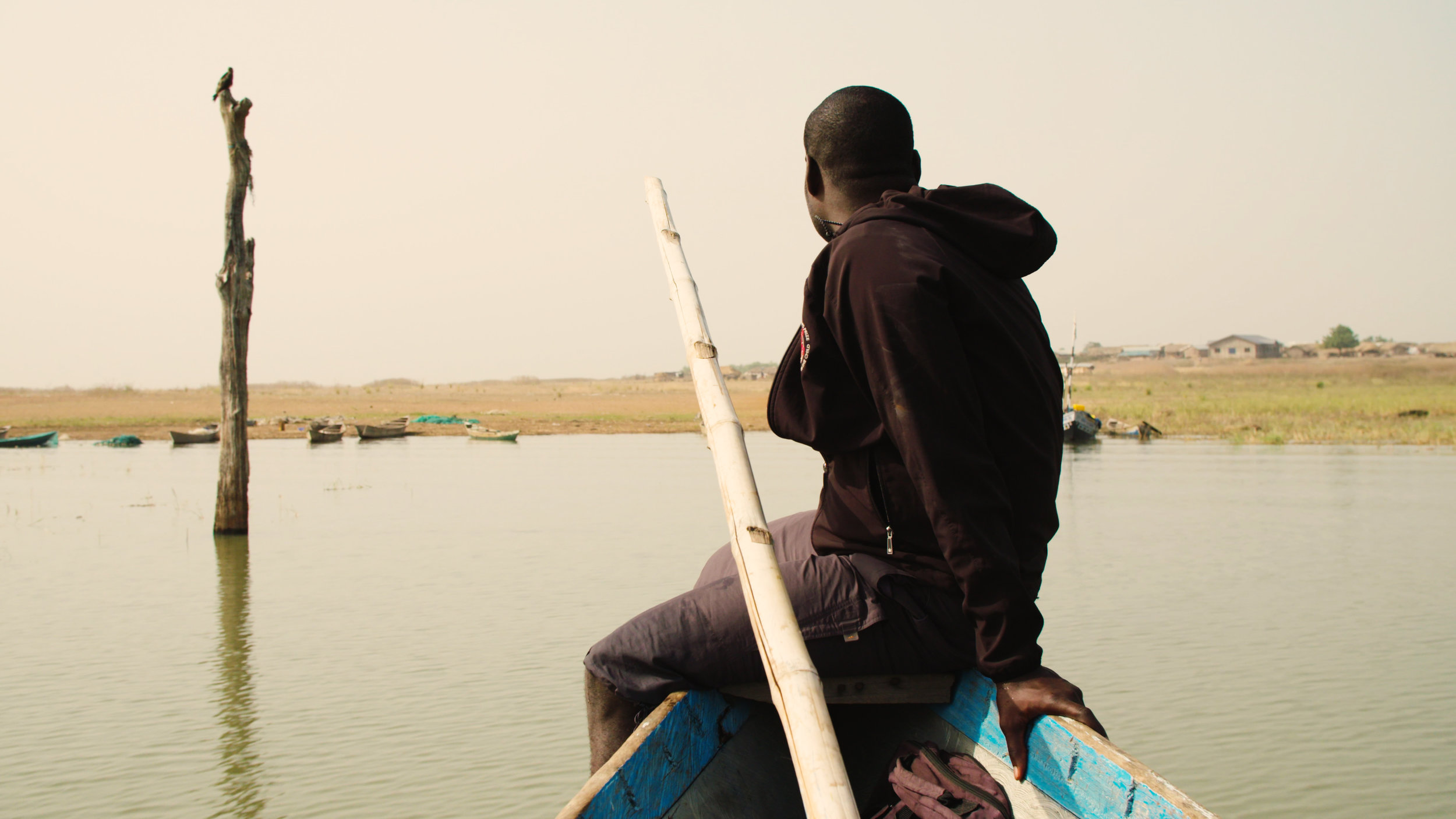 Kwame on rescue boat approaching shore.jpg