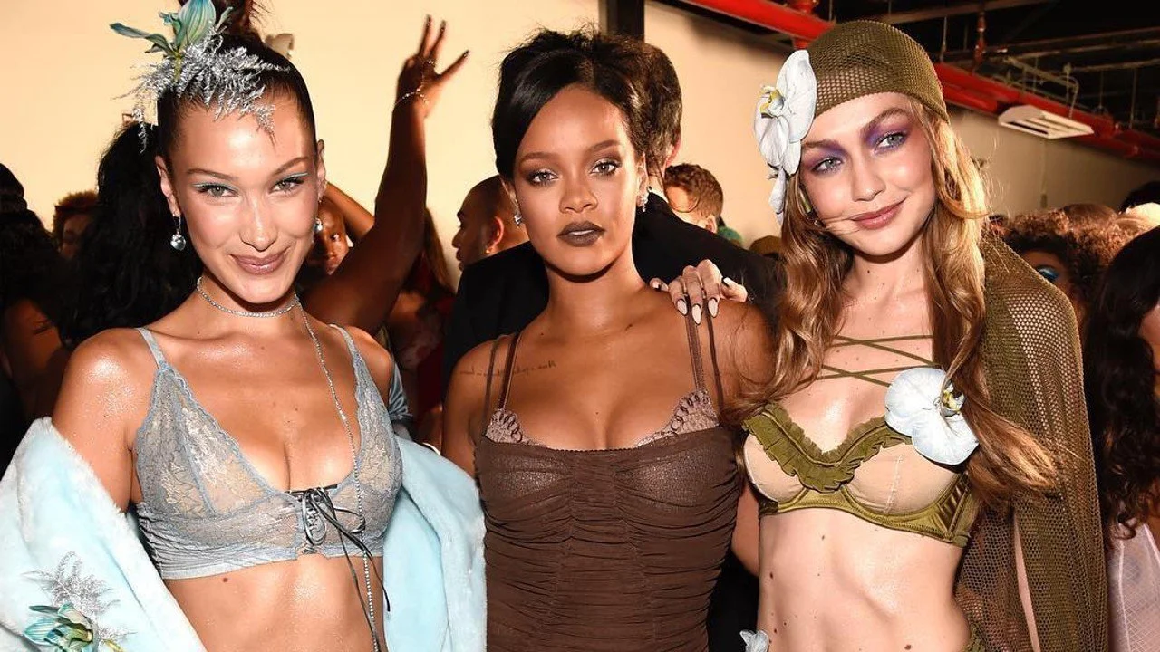Rihanna (centre) sandwiched by the Hadid sisters (Left; Bella, Right; Gigi) at her Savage X Fenty lingerie show at NYFW. (Source: South China Morning Post)