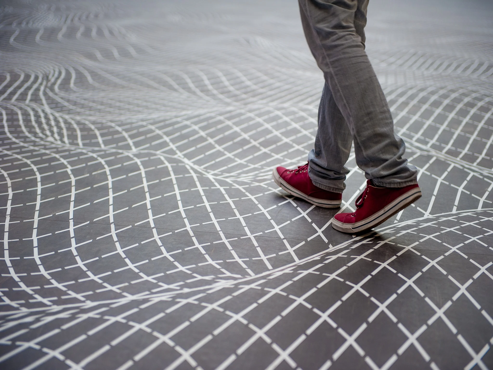BMW xWalk // BMW Middle East Serviceplan Hamburg & Serviceplan Middle East To let everyone experience the BMW xDrive, the intelligent all-wheel drive system, we created an 3D-floor sticker comprising of 50,000 Xs. Pedestrians see the illusion as uneven, but the ground feels surprisingly smooth once walked over.