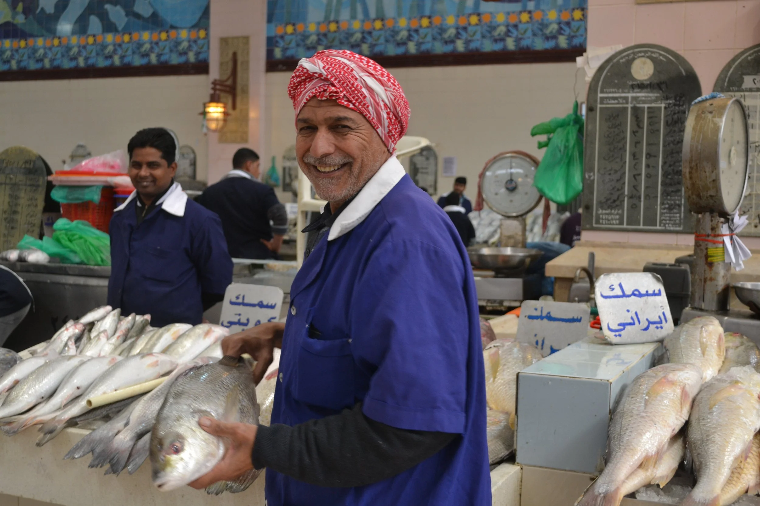 Kuwaiti fish seller in the Kuwait Fish Market