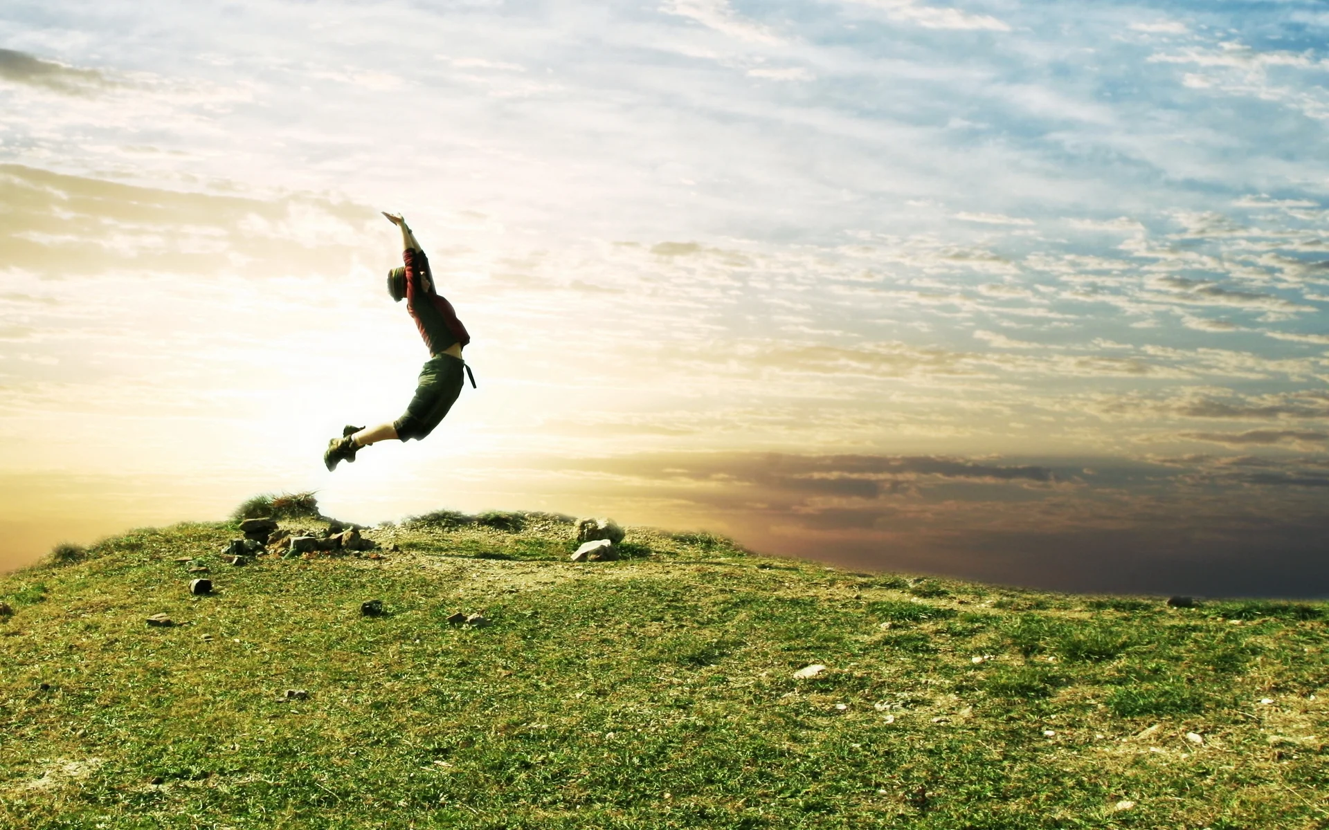 jump_people_field_grass_sky_nature_54406_1920x1200.jpg