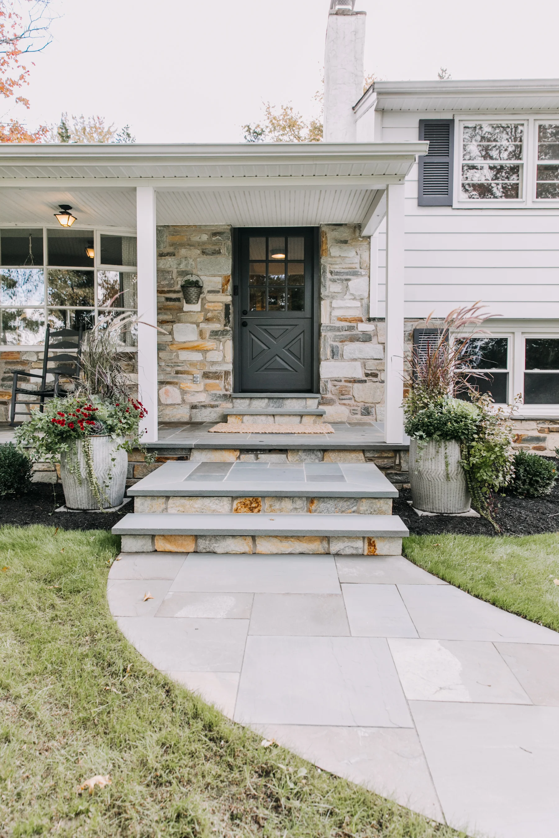 I had so much fun getting these planters ready for fall. Updating the plantings for each season will definitely be something I look forward to throughout the year. Here, I used planters from The Living Earth and then layered in cabbage plants for a fall touch.