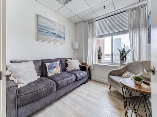 Therapy room with a sofa at Anchor Therapy in Hoboken, NJ