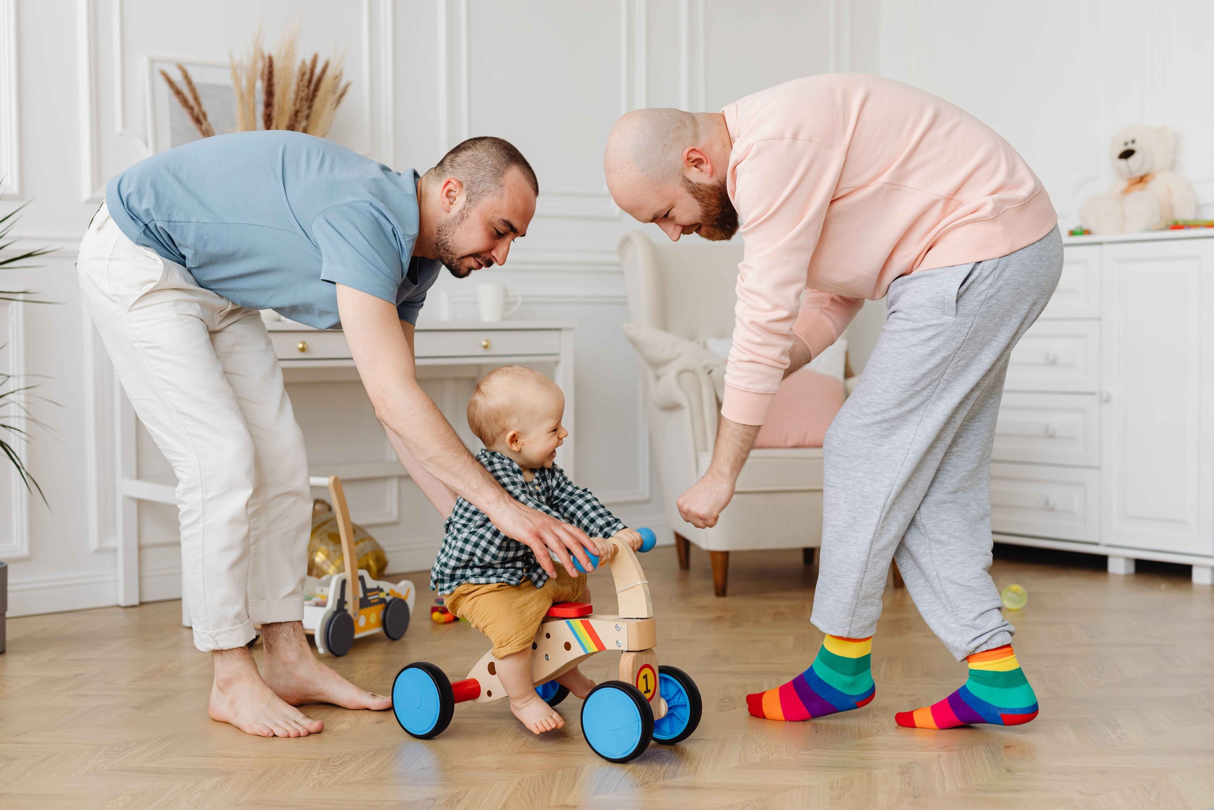 Two parents helping their toddler play at home while co-parenting with a narcissist, Hoboken NJ therapist