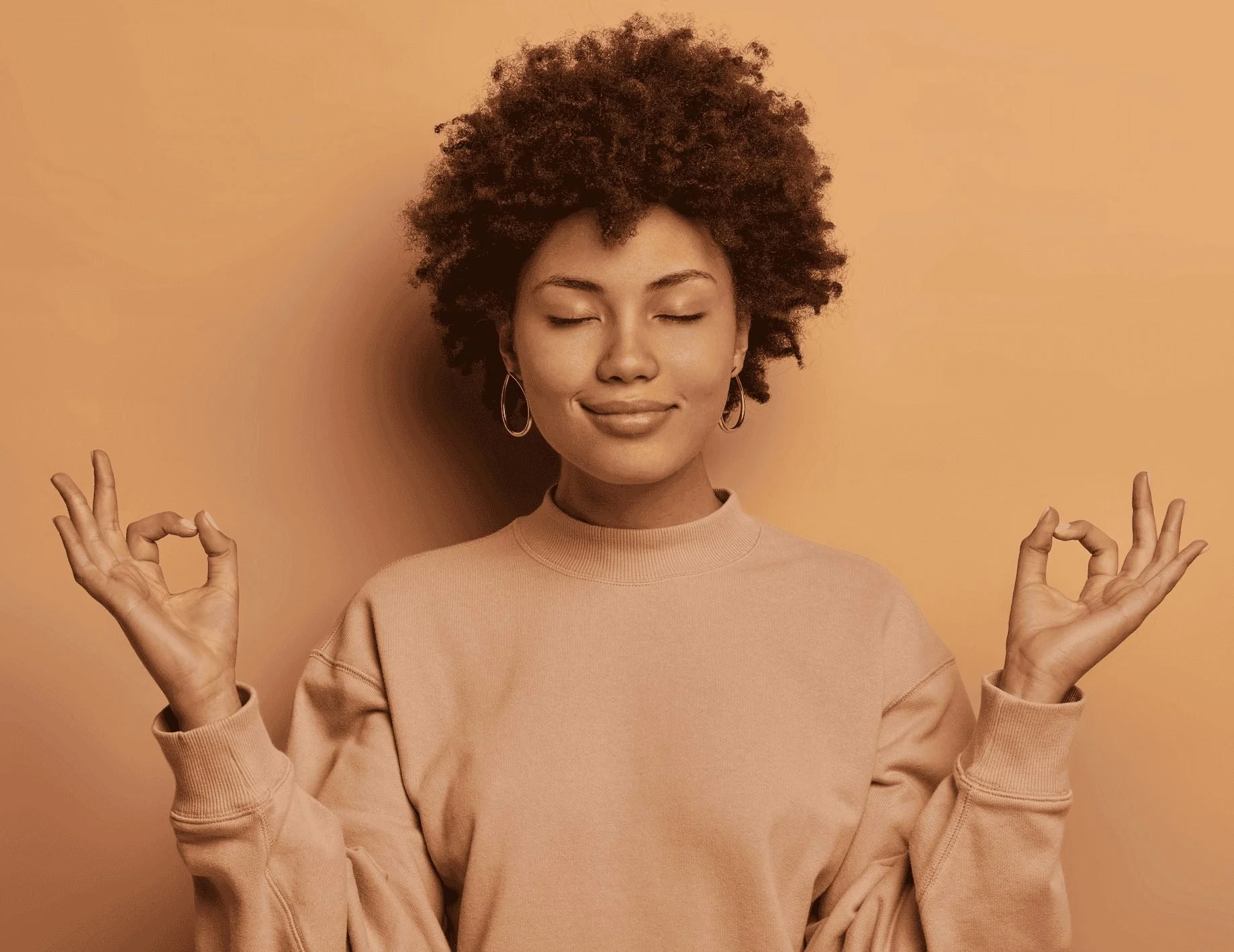 woman reducing stress by meditating in NYC