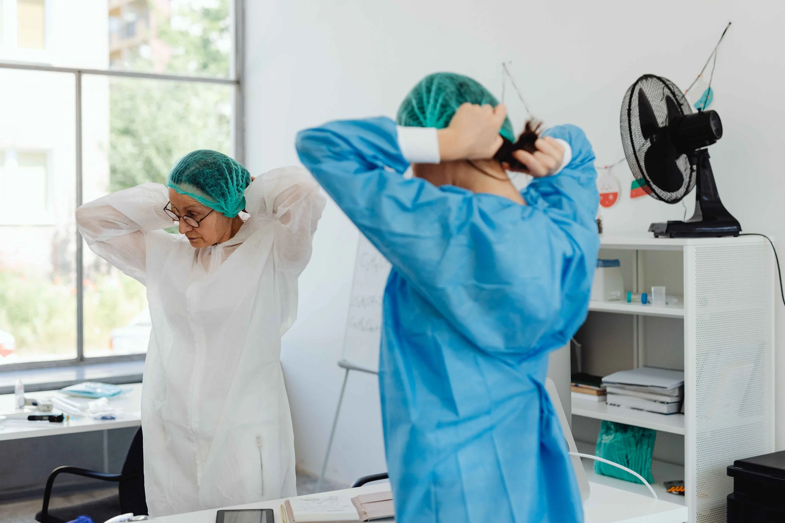 Healthcare workers preparing for a shift while dealing with burnout, Hoboken NJ therapist