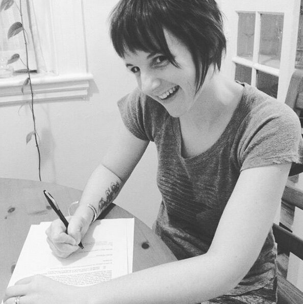  Photo of Heather signing first book contract 