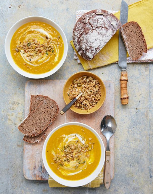 Roasted carrot soup with savoury granola recipe created by Emma for Liz Earle Wellbeing magazine Photography by Georgia Glynn Smith
