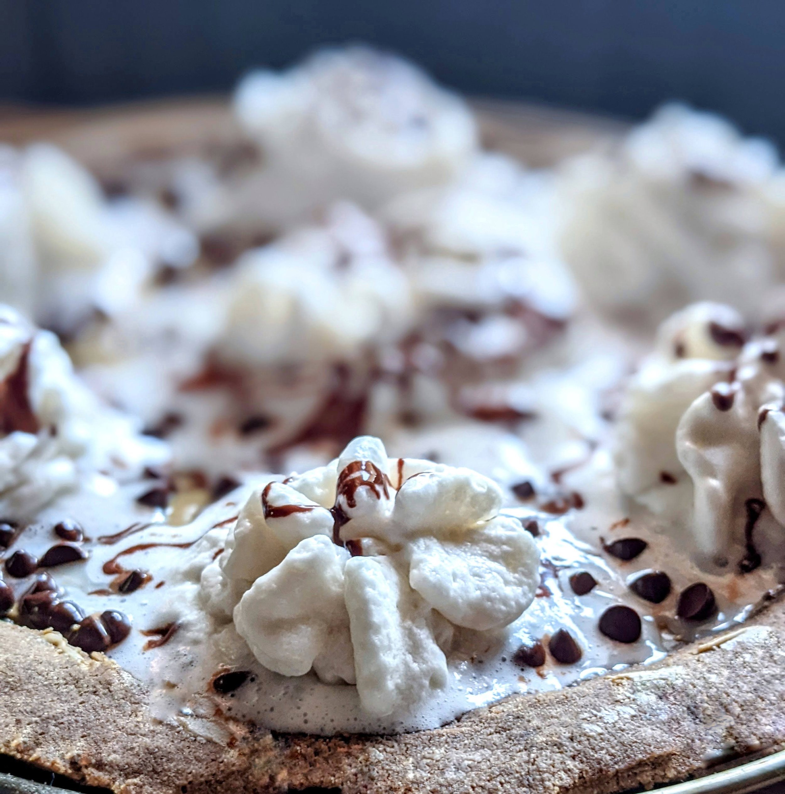 Bare Life Hot Chocolate Pizza Dough sunfun butter & choco chips whipped cream close up.jpeg