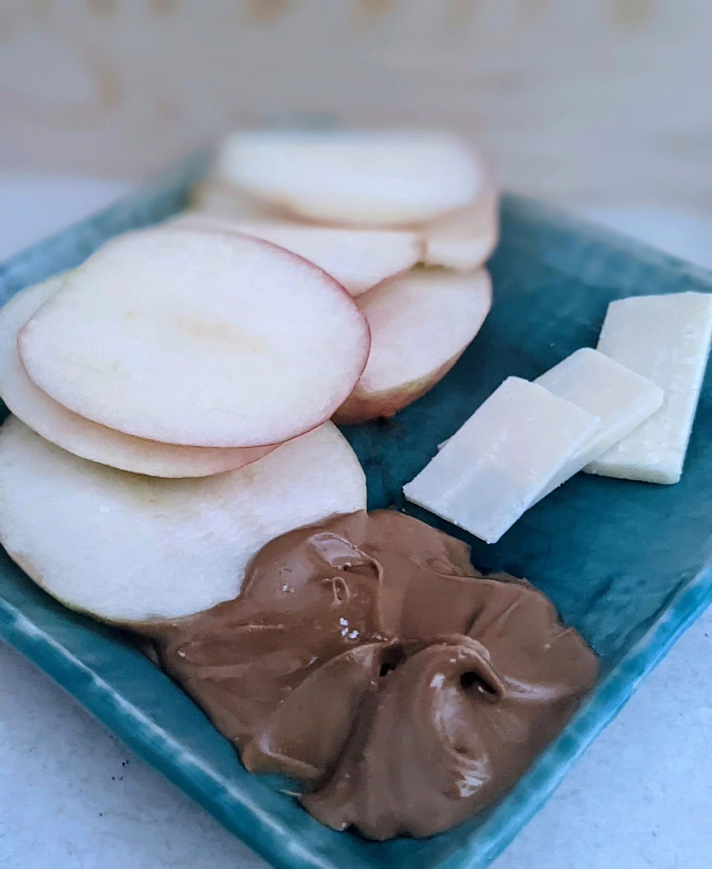 This snack may not look special, but trust me it is awesome!

Pairing a pink lady apple with SunFun Butter &amp; cheddar cheese is a creamy taste buds delight that adds a sweet tart flavor with a little bitter from the butter. I like it with a shake 