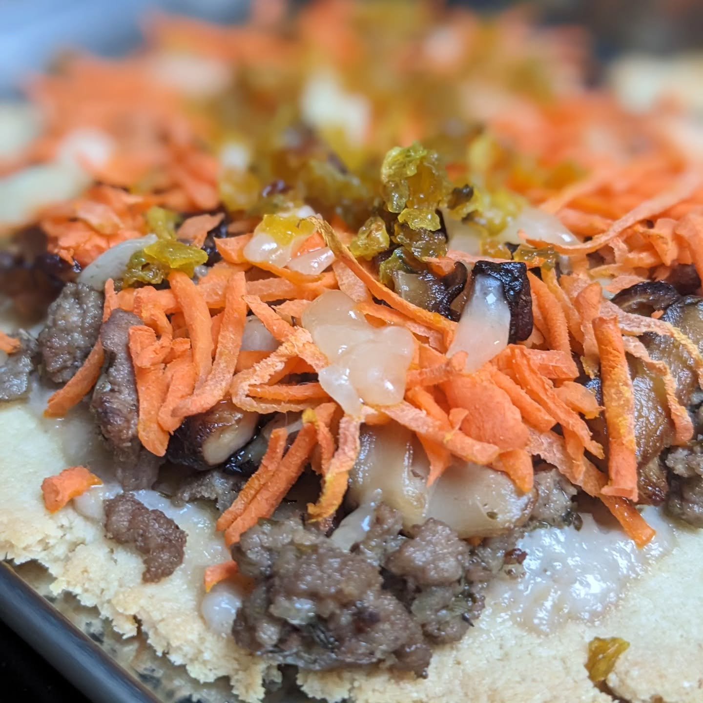 For my Foodie-in-Crime's birthday, pizza was requested &amp; we made an SCD crust &amp; ripped it with ground meat, shiitake mushrooms, onions &amp; carrots &amp; dairy free Alfredo sauce.

#GlutenFreeBirthday #SCDpizza #dairyfreepizza