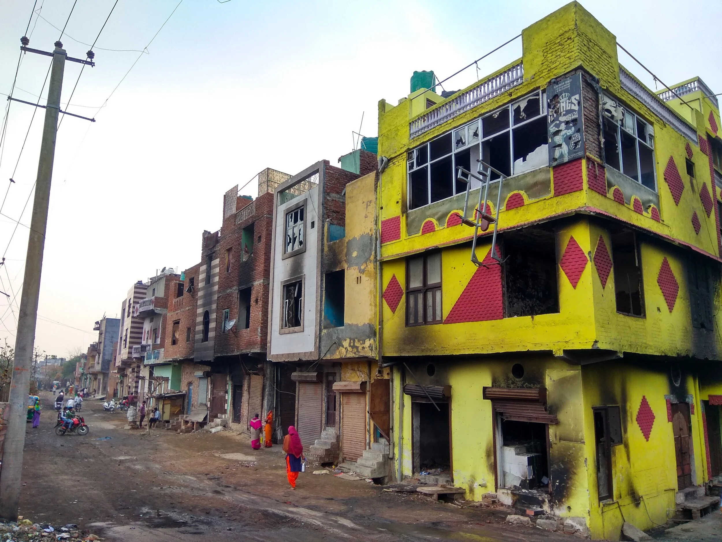 A row of buildings that were targeted by arson during riots. North East Delhi Riots 2020