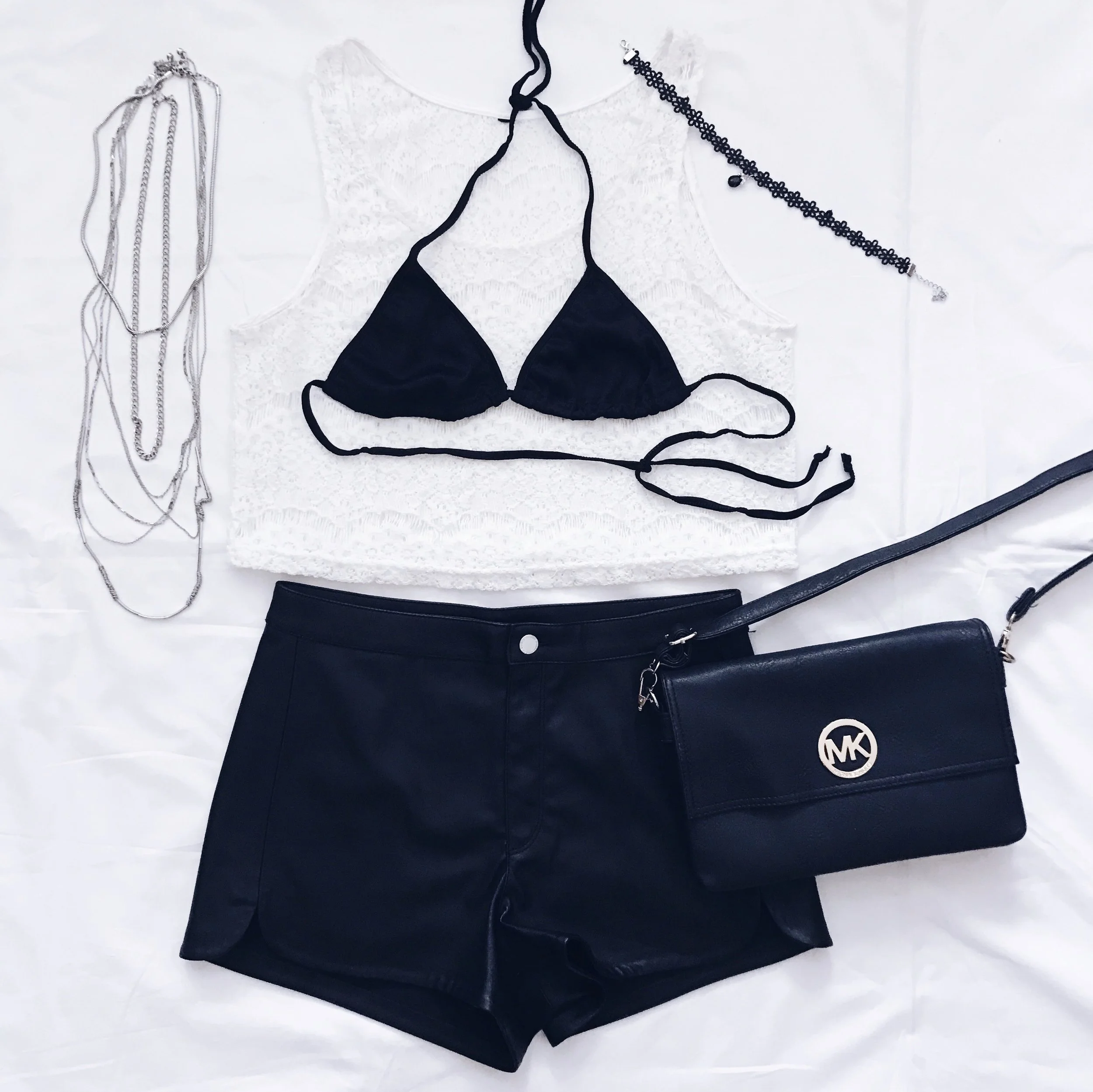 White Lace Crop Top: Terranova Leather Shorts: H&M Crossbody Bag: Michael Kors Bikini Top: Asos Necklace Set & Chain Necklace: H&M Lace Crystal Choker: Amazon Fashion