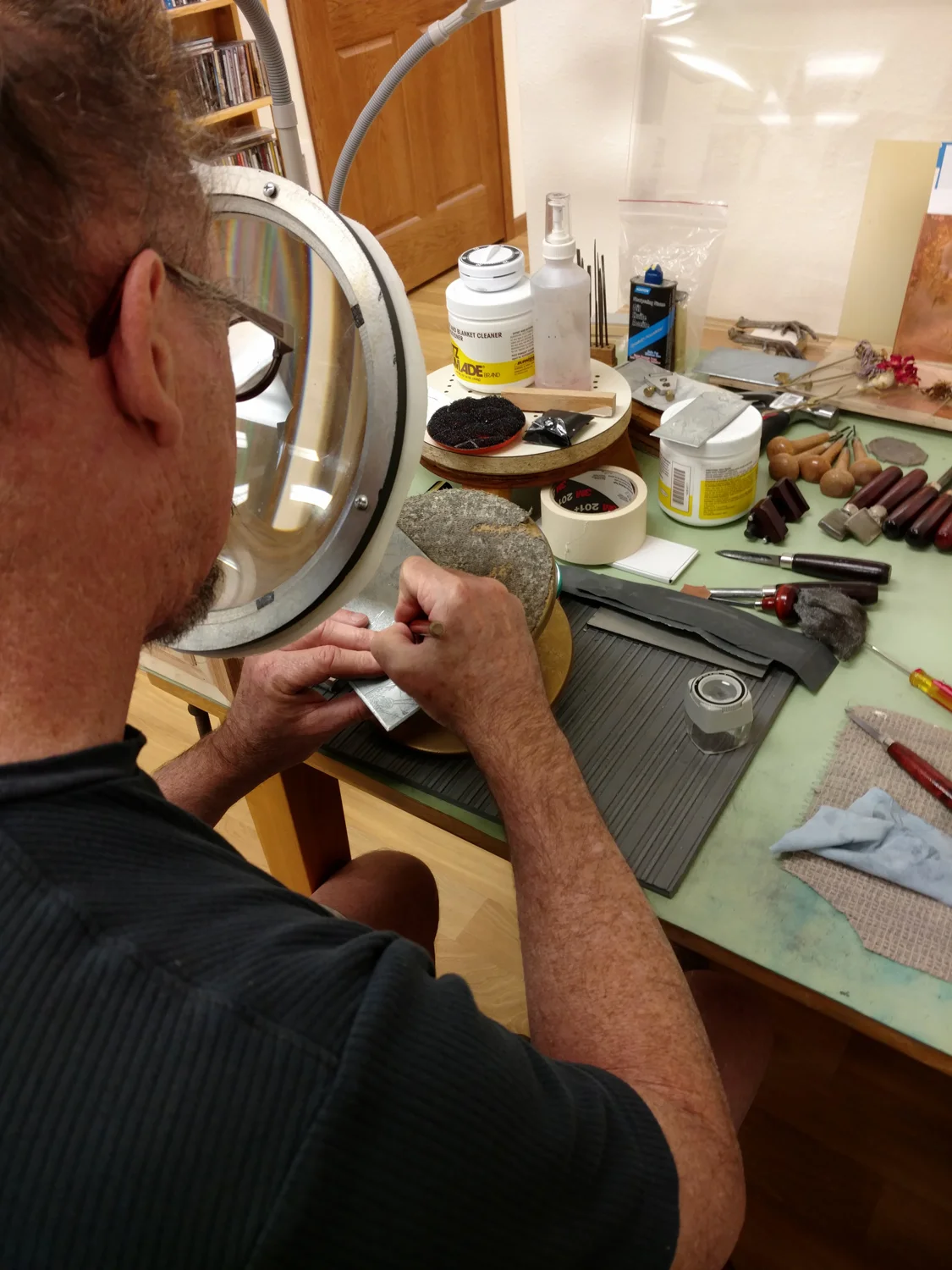 Working on one of many mixed intaglio plates he has in the works!