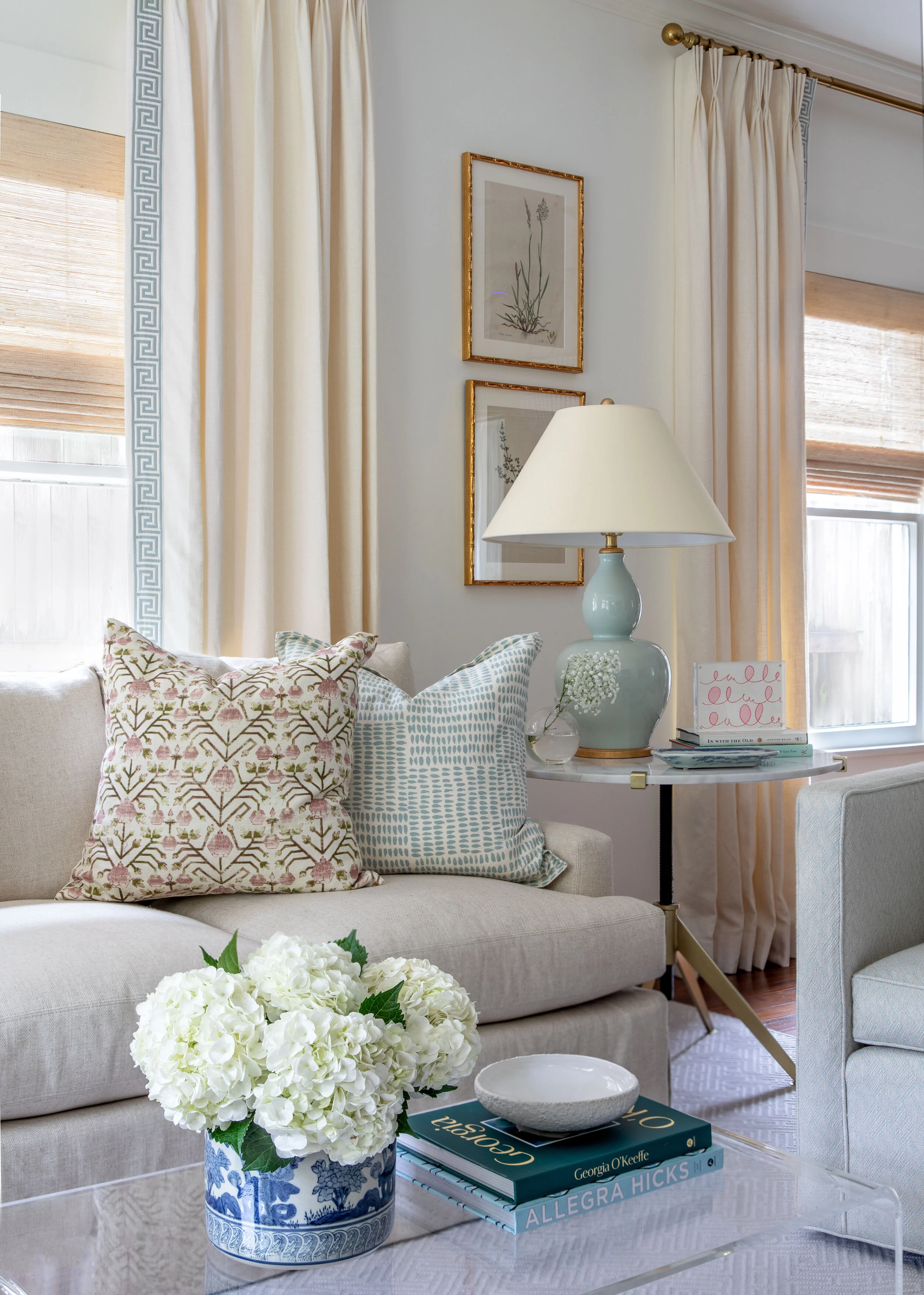 White Flowers on Coffee Table with Bright French Country Designed Living Room