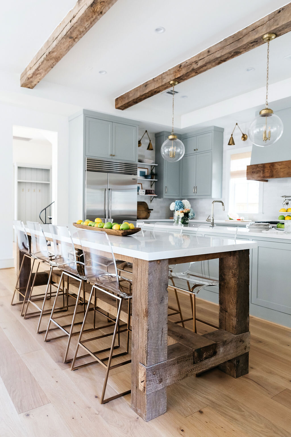 Eat In Kitchen with Exposed Wood Beams | Houston Interior Design Firm