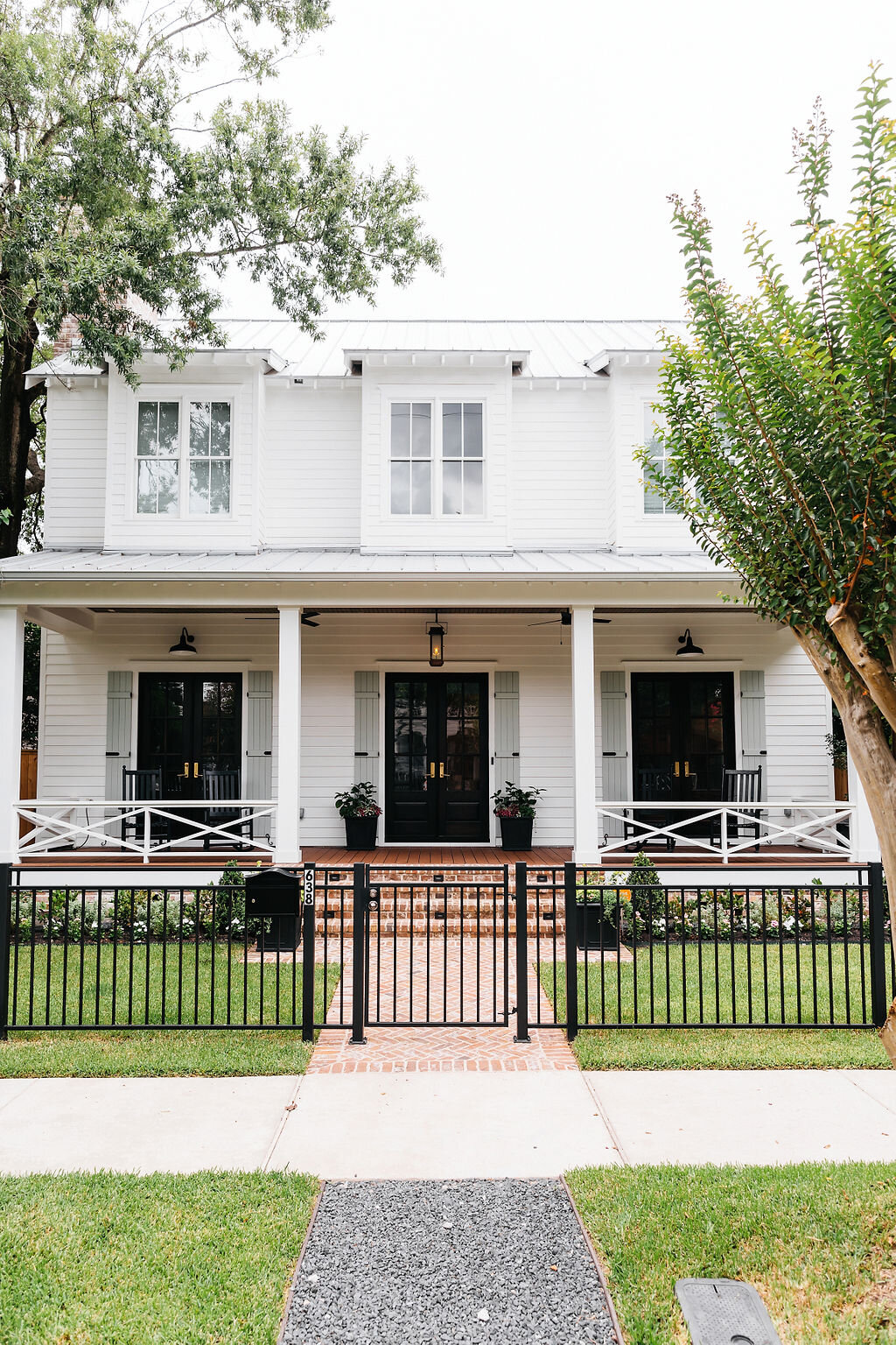 White Classic House with Green Grass Lawn | Houston Interior Design Firm