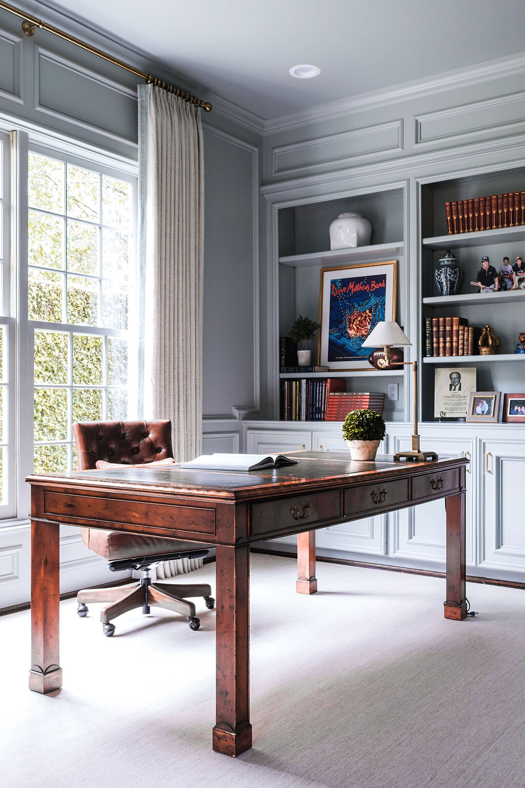 Wood Desk in front of Floor-to-Ceiling Wood Book Shelves | Best Master Bedroom Design Ideas