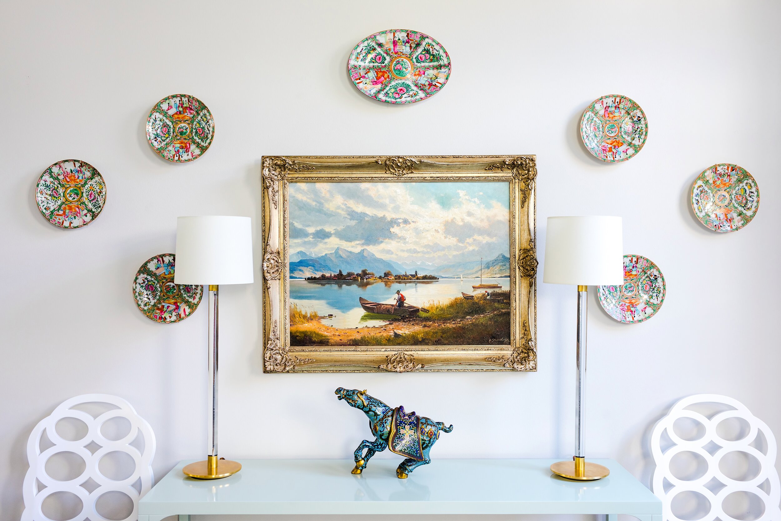 Hanging Plate Decorations with White Table and Painting