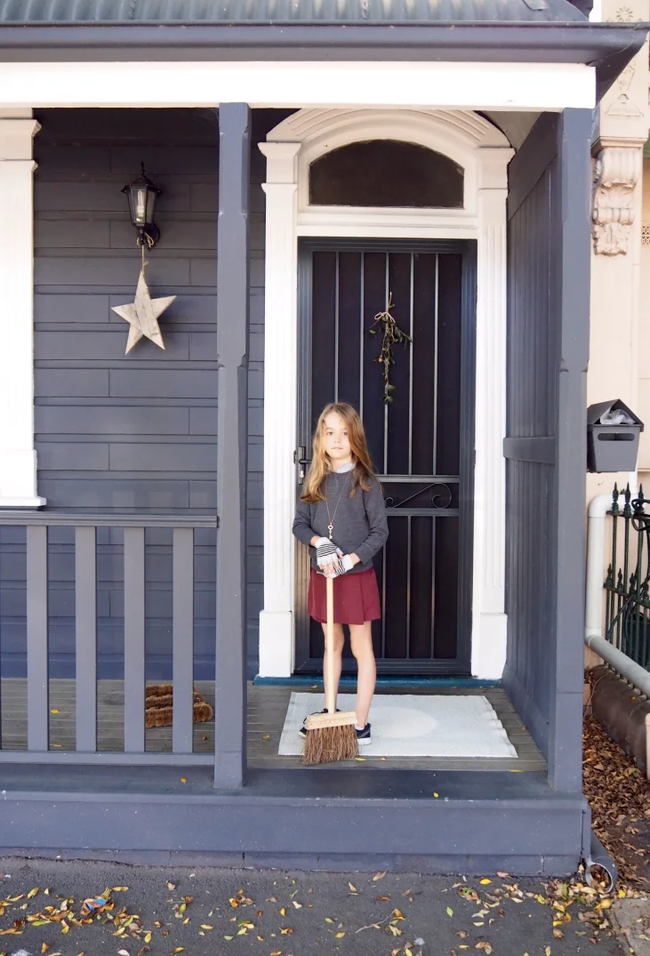 Ella gets in some sweeping with Pappa Sven's cute brooms. Photo: Sheriden Rhodes