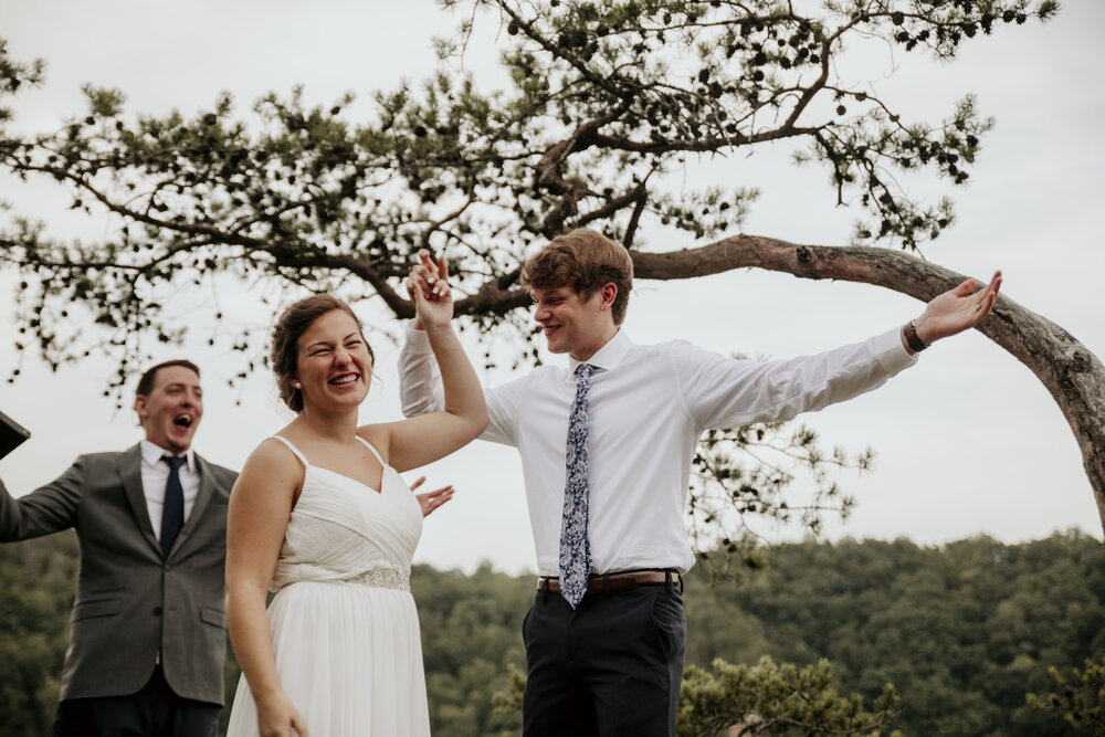  The couple celebrates after their Fall Creek Falls Secret Overlook elopement. 