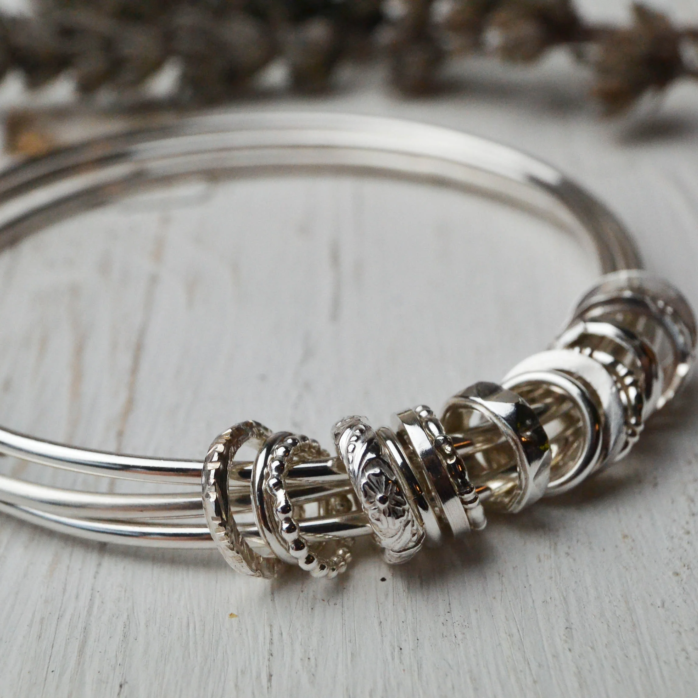 three bangles with charms2.jpg