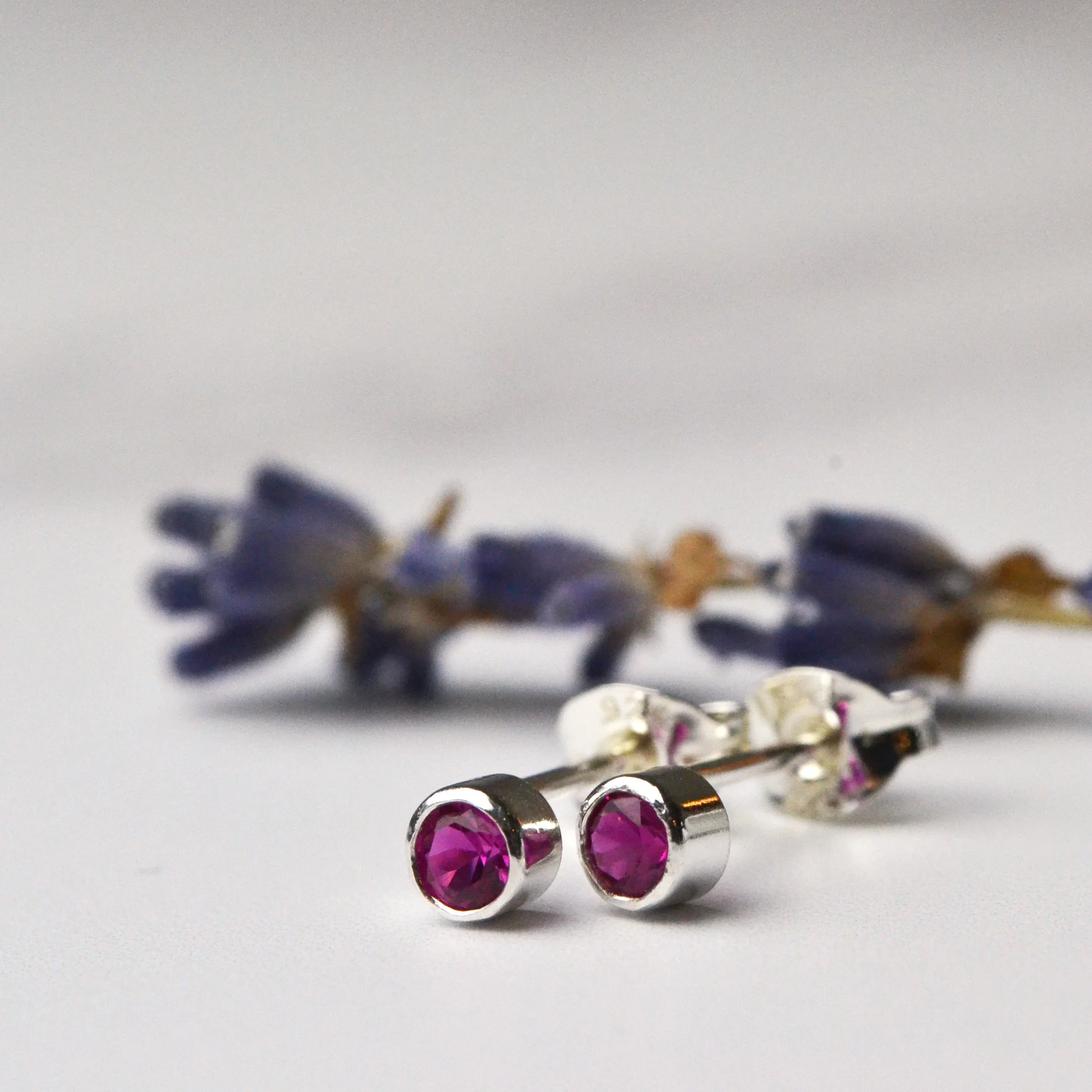 ruby 3mm stud earrings.jpg