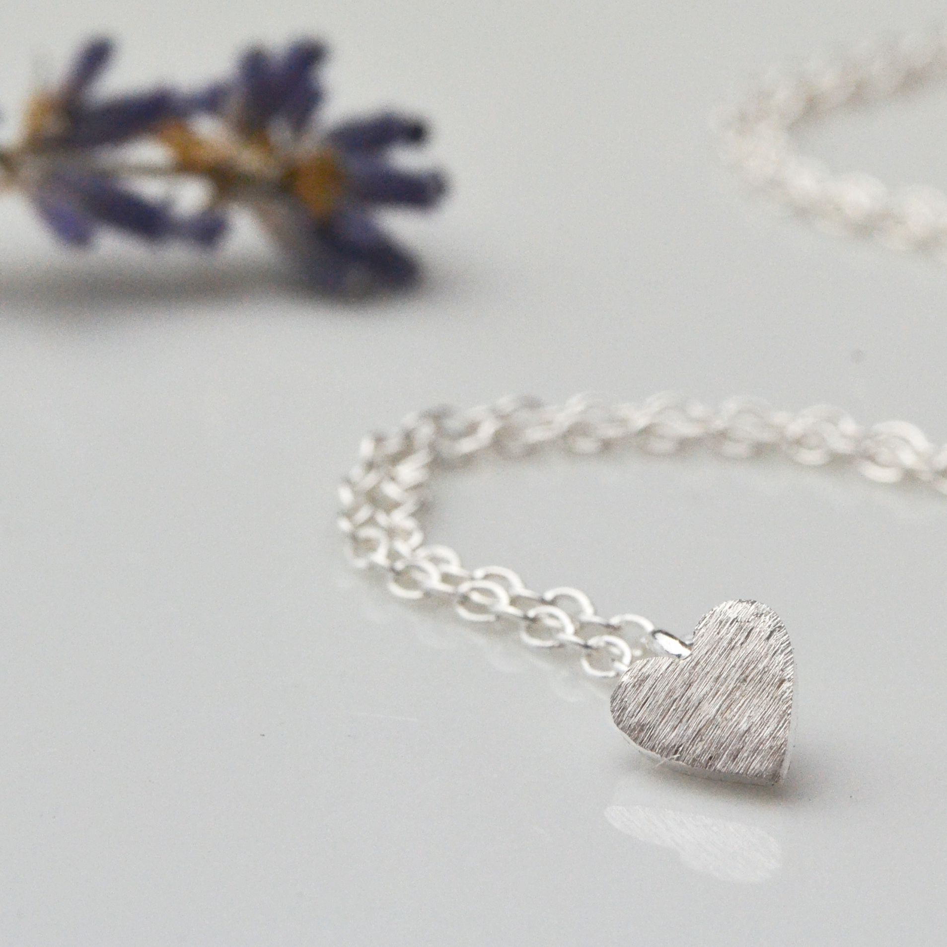 Teeny Silver Heart Pendant Necklace. Just one of those go with everything necklaces that you can just wear all the time.