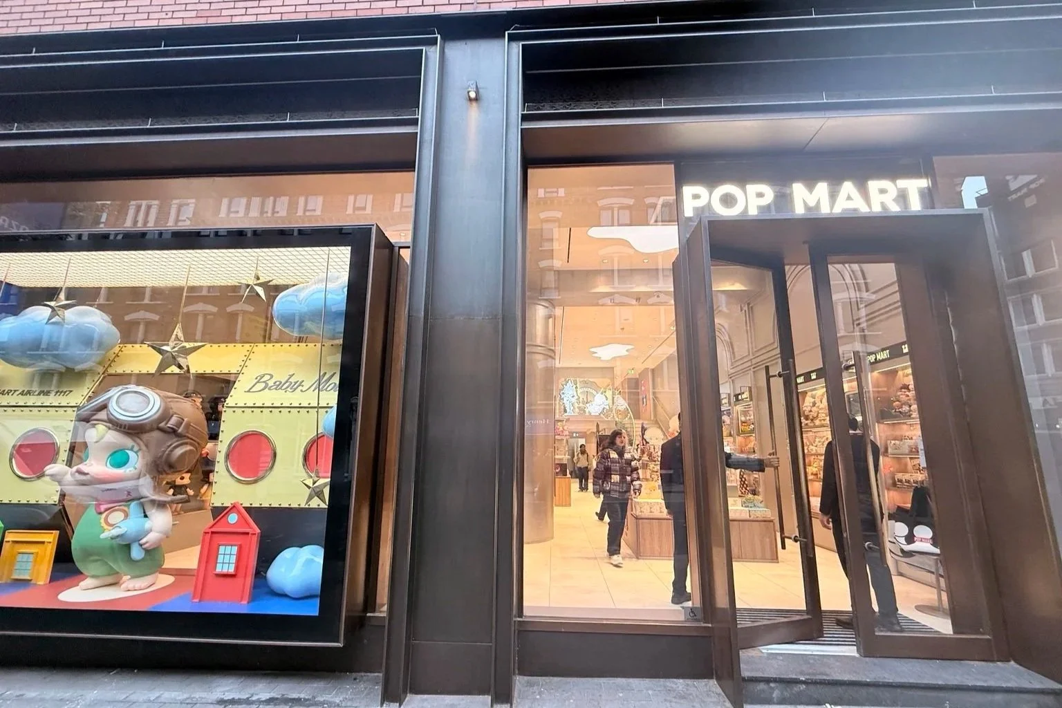    POP MART London store exterior entrance and window display   