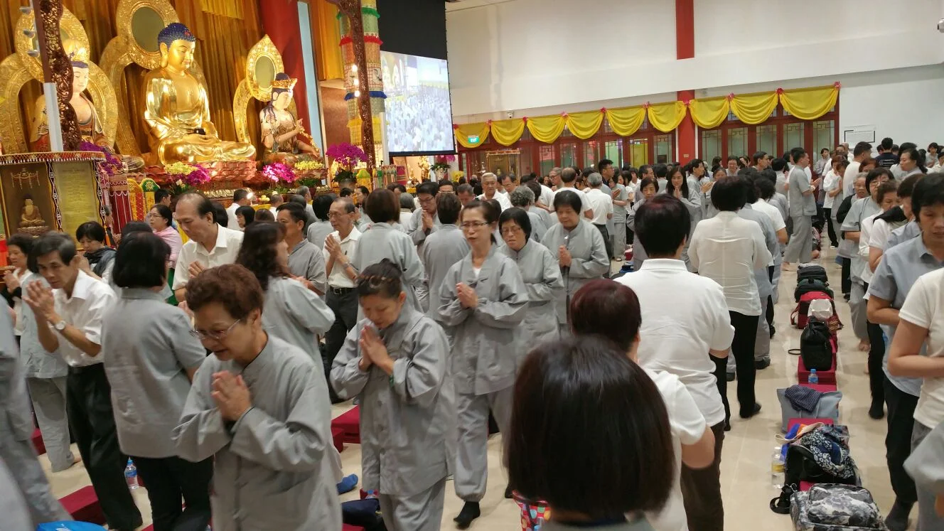 BW Monastery 8 Precepts and Enrichment camp 2: Circumbulating Buddha statues.